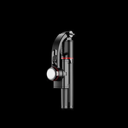 Black and red camera lens with a white light on a black background